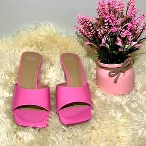 These shoes are a size 7 Barbie pink crown and ivy cute heels